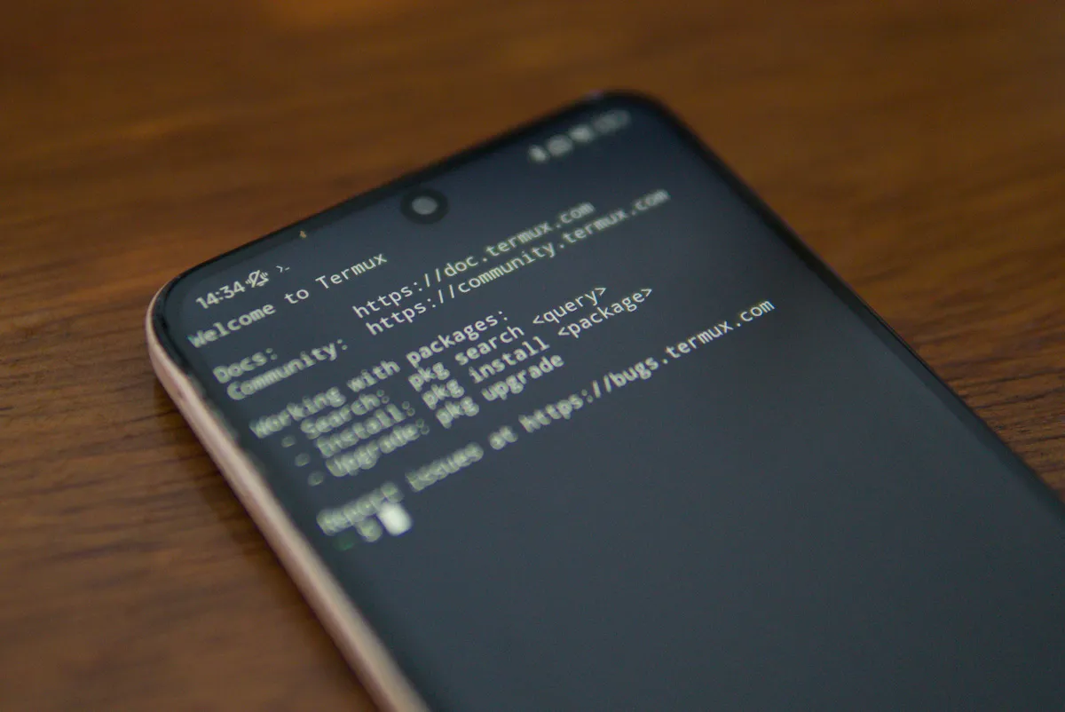 Redmi note 12 phone showing Termux Android app terminal window on the screen.